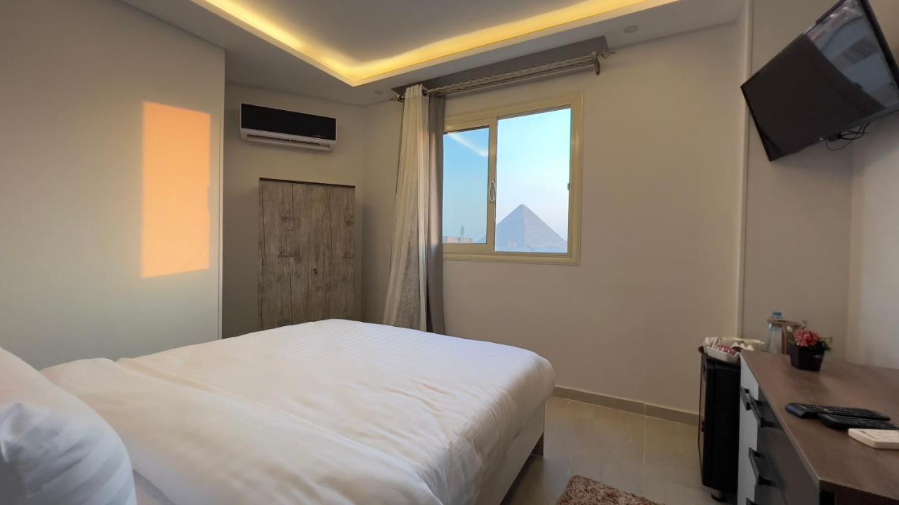 Pyramids Tower View Inn Nazlat as Sammān Esterno foto